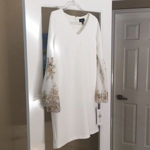 Off-white dress with flared arms/gold accents